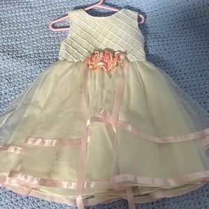 White formal dress with pink ribboning